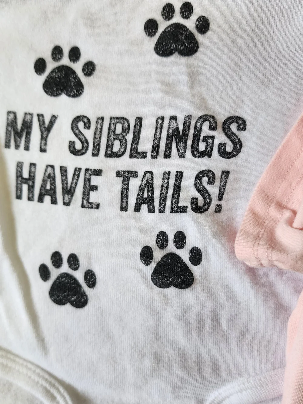 My Siblings Have Paws/Tails Baby Onesies - White & Pink 3M